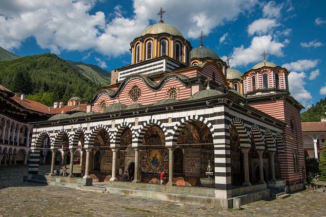 Day tour to Rila monastery, hiking to the cave of St. John and Boyana church - Included coffee, bottled water, and what they mean on a full day