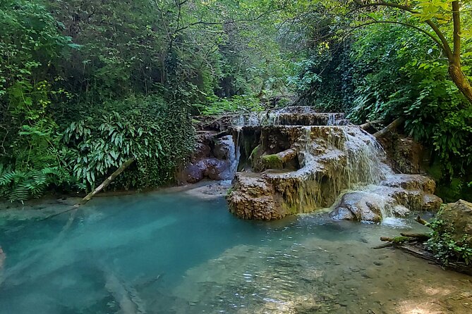 Lovech, Devetashka cave and Krushuna waterfalls - Krushuna Waterfalls: big cascades, green-tinted water, and a forest mood
